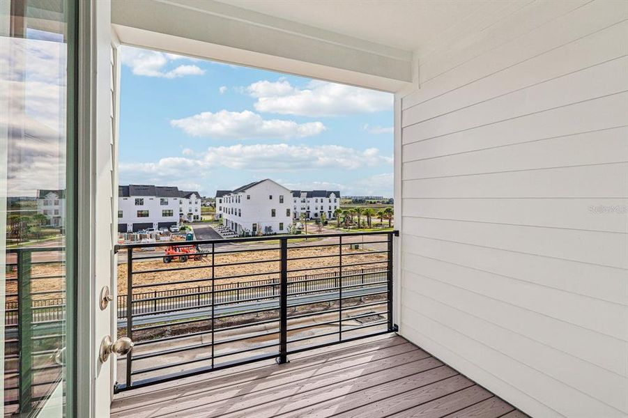 Exterior details and patio area of a home in Parkview at Hamlin, Winter Garden (Image 15).