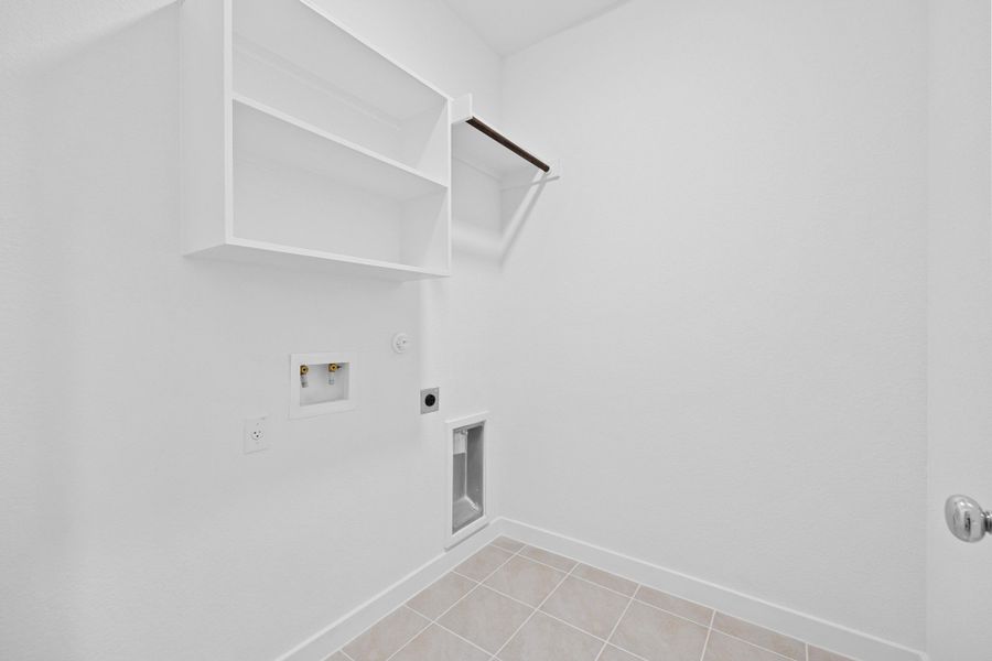 Utility Room in the Oak home plan by Trophy Signature Homes – REPRESENTATIVE PHOTO Utility Room in the Oak home plan by Trophy Signature Homes – REPRESENTATIVE PHOTO