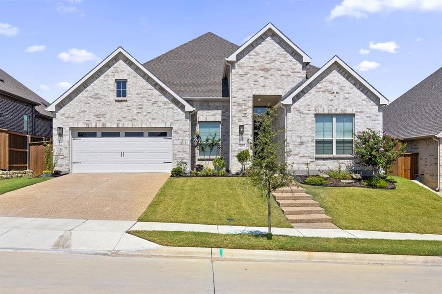 Front exterior of a new home in Inspiration, Lucas, TX, highlighting curb appeal (Image 20).