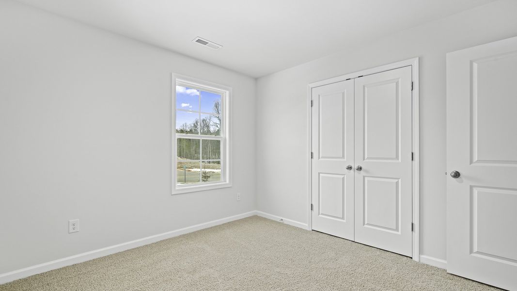 Spacious, unfurnished interior of a new home in Lybrook Village, Advance (Image 15).