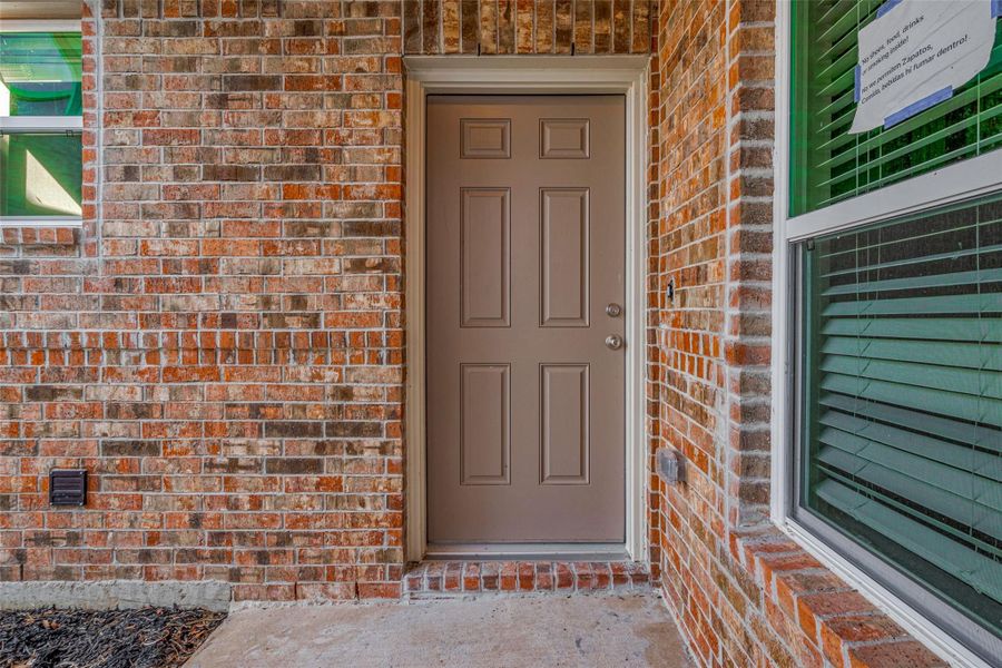 Exterior details and patio area of a home in Mill Creek Trails, Magnolia (Image 23).