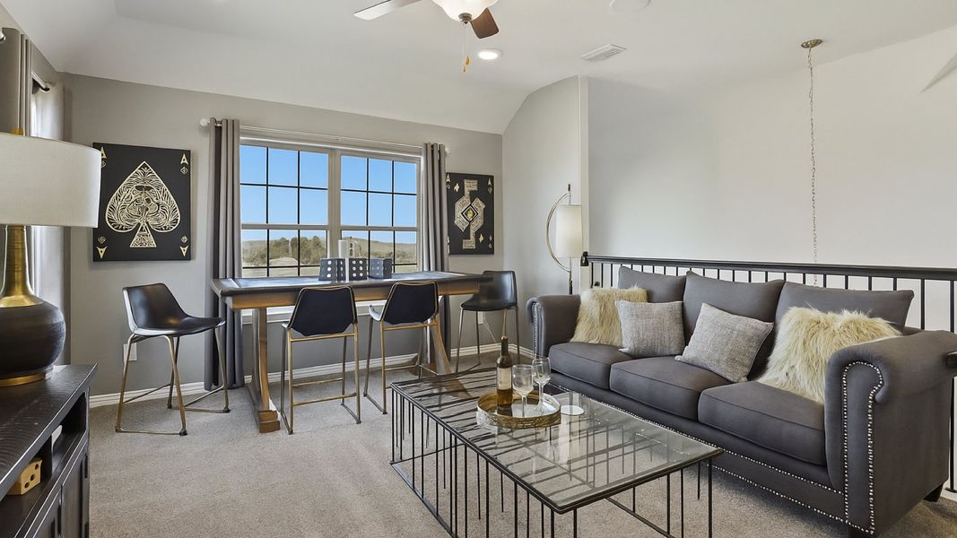 Representative furnished interior of a home built from the Hickory by Brightland Homes in Sunterra, Katy (Image 10).