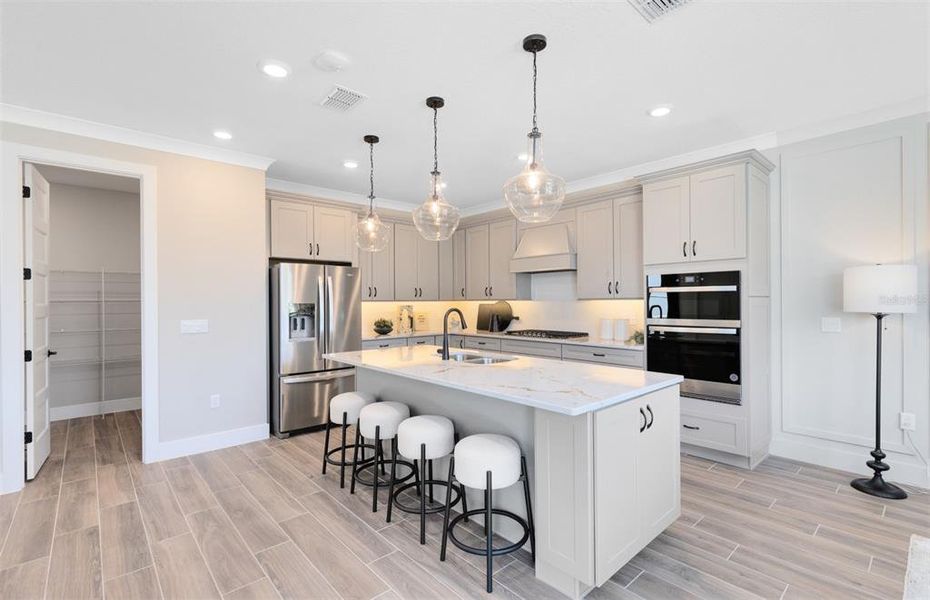 Furnished interior view inside a new home in Parkside Trails, Clermont (Image 8).