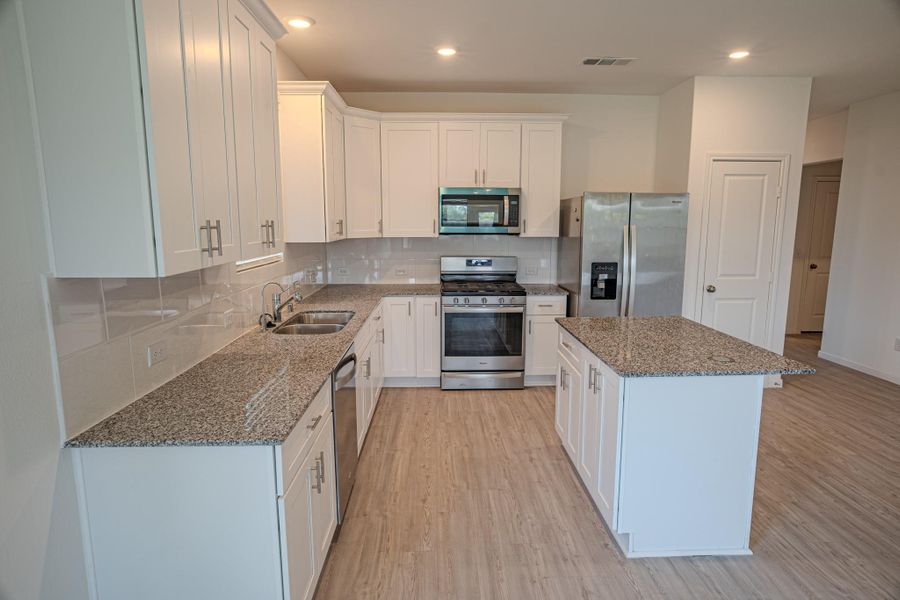 Furnished interior view inside a new home in Mustang Ridge, Alvin (Image 7).