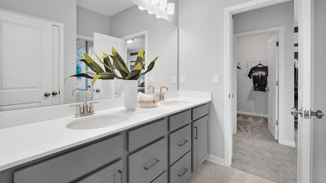 Furnished interior in a model home at Stratford Hills in Ball Ground (Image 18).