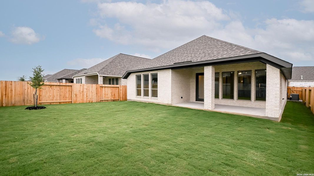 Exterior details and patio area of a home in Meadows of Mill Creek, Seguin (Image 18).