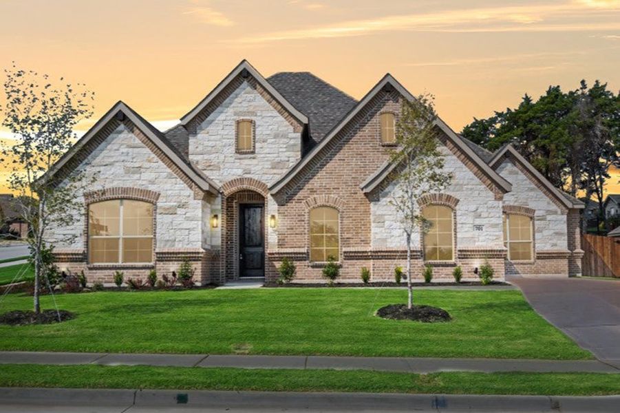 Elevation C with Stone | Concept 2796 at Coyote Crossing in Godley, TX by Landsea Homes