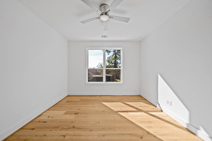 Upstairs secondary bedroom (one of 3). This one faces the front of the house.