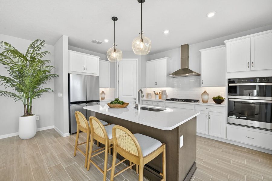 Representative furnished interior of a home built from the Woodruff by Mattamy Homes in Summerlit, Naples (Image 6).