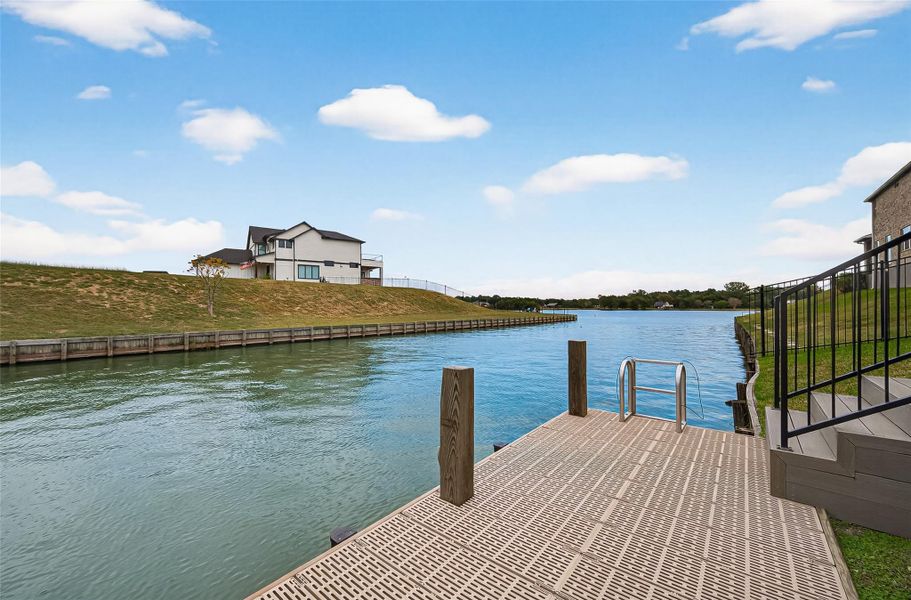 Private composite dock with built-in ladder for lake access—ideal for paddleboarding, fishing, or simply enjoying the view. Private composite dock with built-in ladder for lake access—ideal for paddleboarding, fishing, or simply enjoying the view.