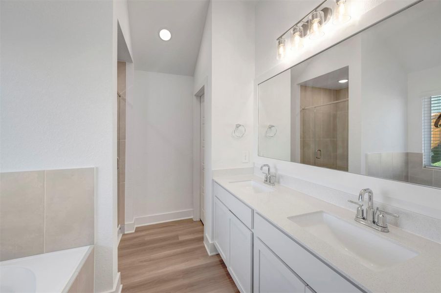 Furnished interior view inside a new home in Lone Star Landing, Montgomery (Image 5).