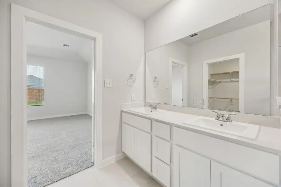 Primary Bathroom in the Stanley II home plan by Trophy Signature Homes – REPRESENTATIVE PHOTO Primary Bathroom in the Stanley II home plan by Trophy Signature Homes – REPRESENTATIVE PHOTO