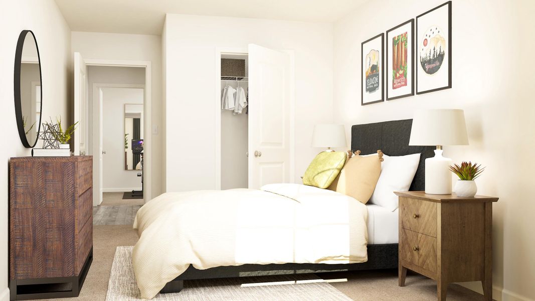 A bedroom with a bed and a dresser.