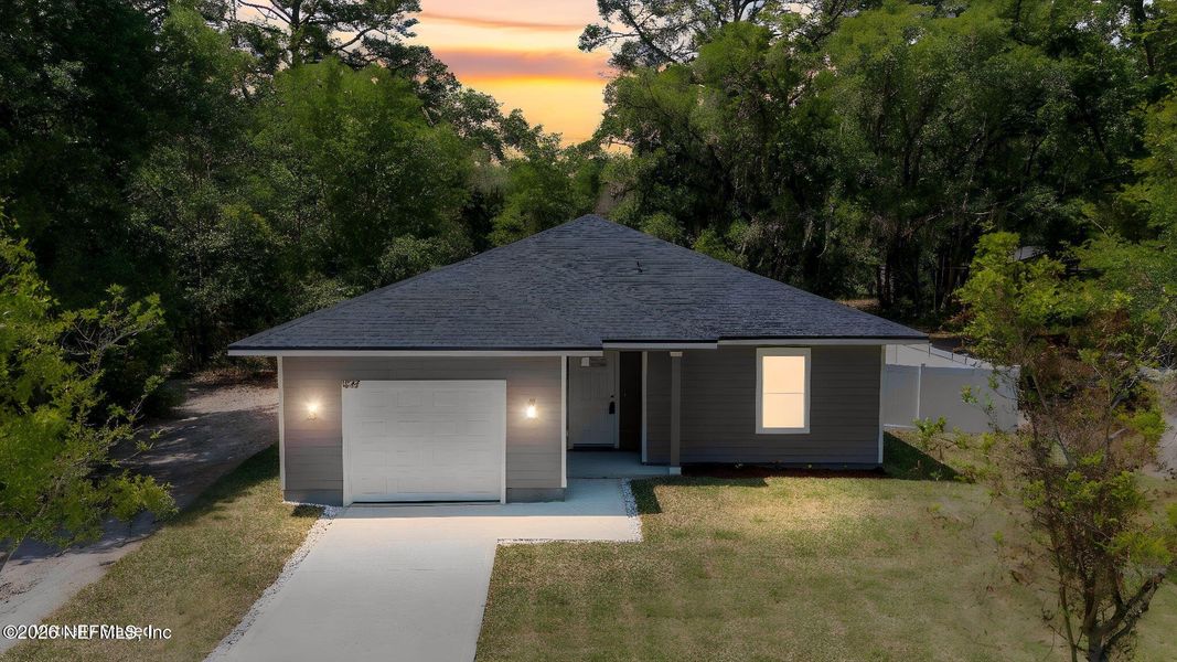 Front exterior of a new home in , Jacksonville, FL, highlighting curb appeal (Image 26).