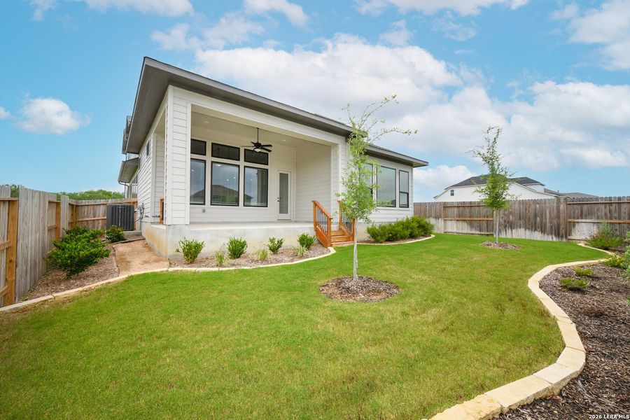 Exterior details and patio area of a home in Nolte Farms, Seguin (Image 20).