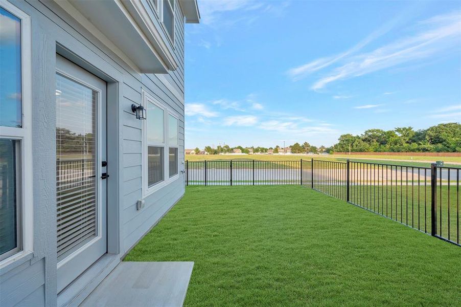 Exterior details and patio area of a home in Providence Commons, Providence Village (Image 2). Exterior details and patio area of a home in Providence Commons, Providence Village (Image 2).