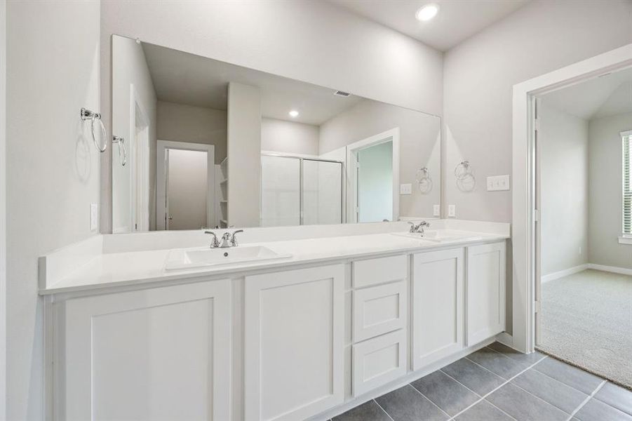 Primary Bathroom in the Mesquite home plan by Trophy Signature Homes REPRESENTATIVE PHOTO Primary Bathroom in the Mesquite home plan by Trophy Signature Homes REPRESENTATIVE PHOTO