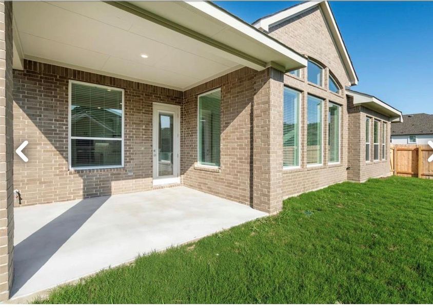 Exterior details and patio area of a home in Water Oak, Georgetown (Image 18).