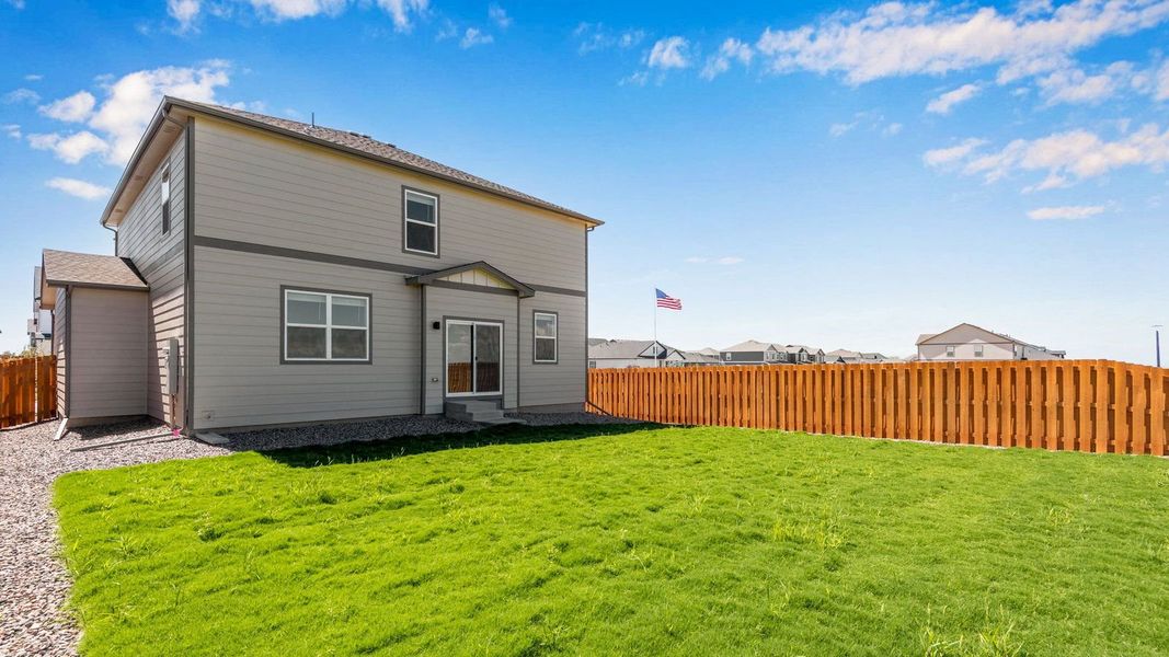 Exterior details and patio area of a home in Vista Meadows, Fort Lupton (Image 4).