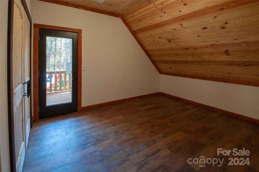 upstairs bedroom/office with balcony