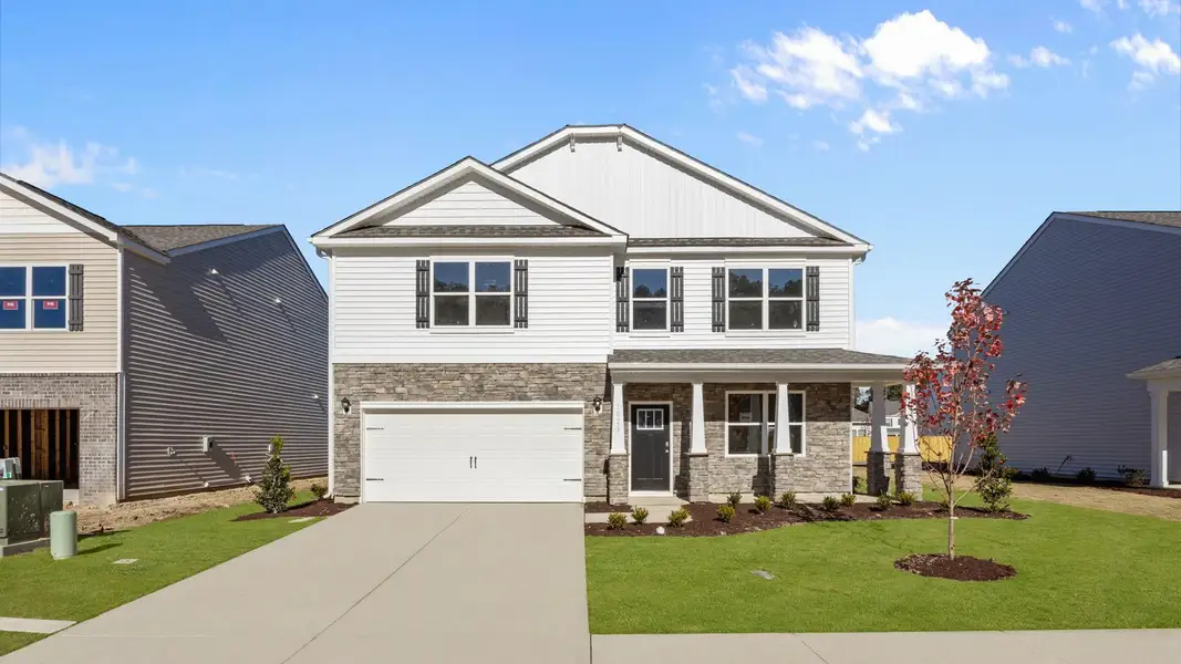 Front exterior of a new home in West New Bern, New Bern, NC, highlighting curb appeal (Image 1). Front exterior of a new home in West New Bern, New Bern, NC, highlighting curb appeal (Image 1).