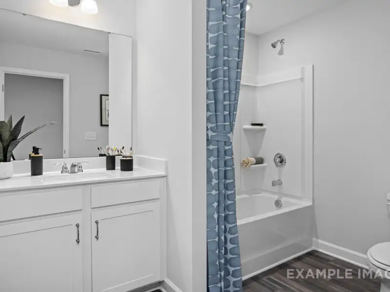 Furnished interior view inside a new home in Addison West, Holly Springs (Image 30).