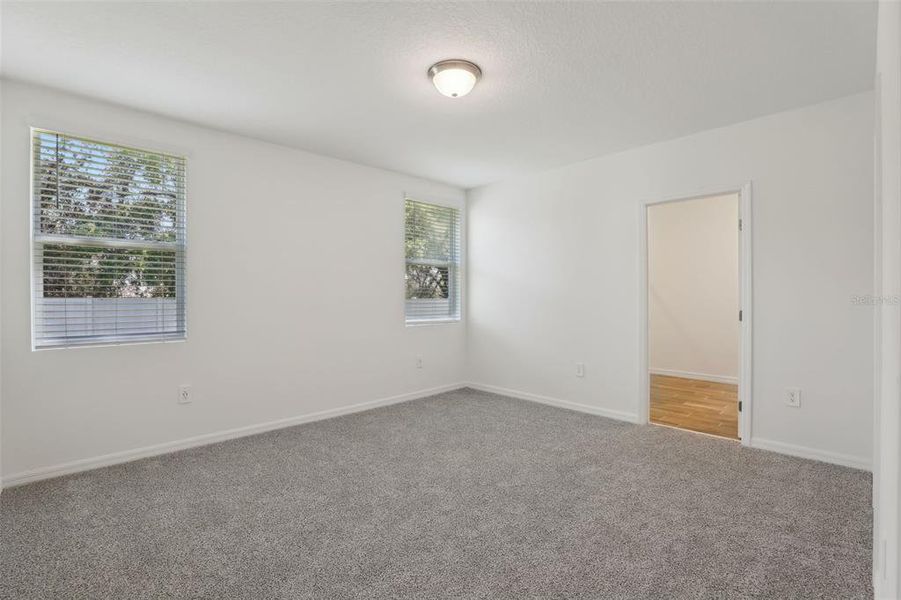 Spacious, unfurnished interior of a new home in Lawson Dunes - Signature Series, Haines City (Image 21).