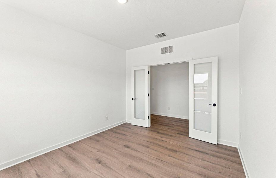 Spacious, unfurnished interior of a new home in West Cypress Hills, Spicewood (Image 15).