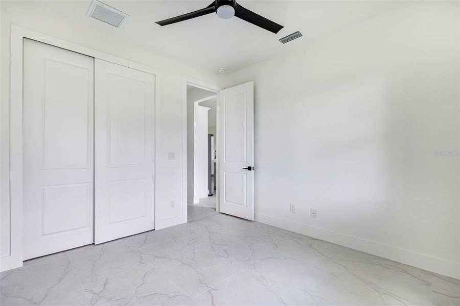 Spacious, unfurnished interior of a new home in , Port Charlotte (Image 20).