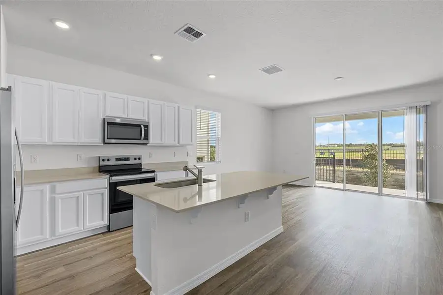 Furnished interior view inside a new home in , Winter Haven (Image 2). Furnished interior view inside a new home in , Winter Haven (Image 2).