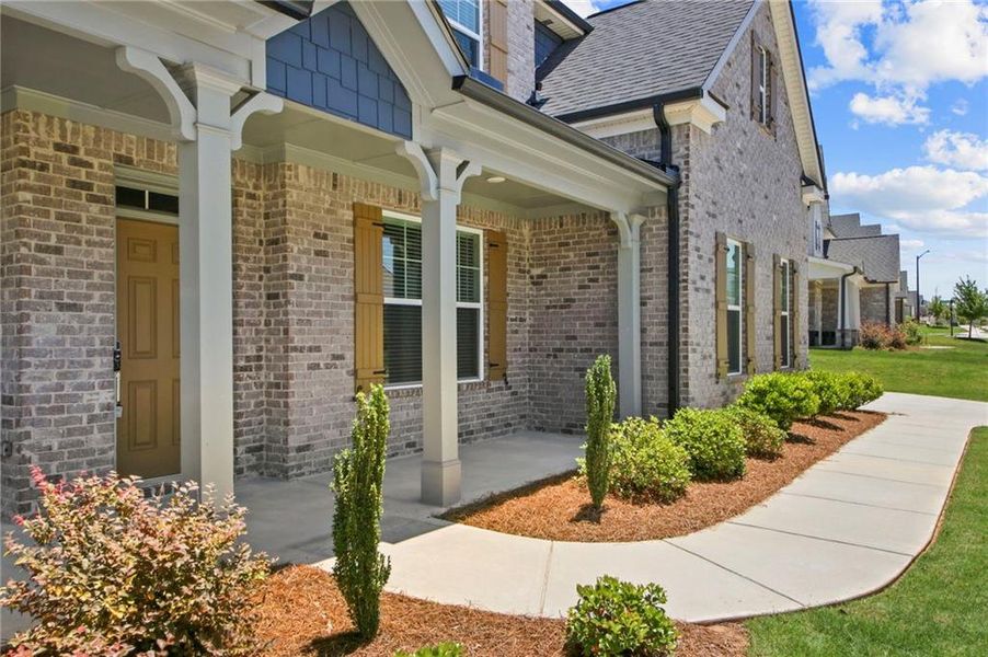 Exterior details and patio area of a home in Carmichael Farms, Canton (Image 3). Exterior details and patio area of a home in Carmichael Farms, Canton (Image 3).