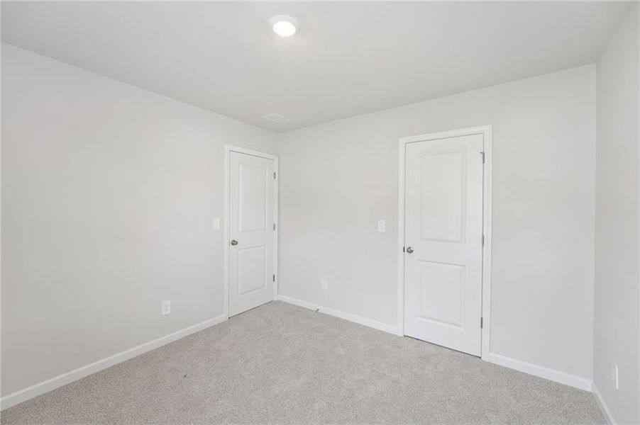 Spacious, unfurnished interior of a new home in Northwoods at Mirror Lake, Villa Rica (Image 22).