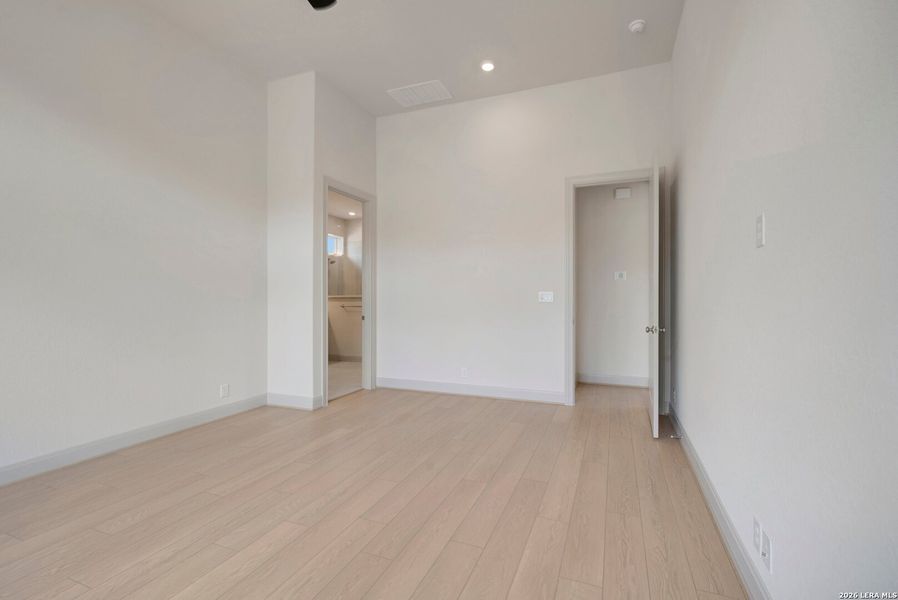 Spacious, unfurnished interior of a new home in Windsong - Legacy Series, Boerne (Image 37).