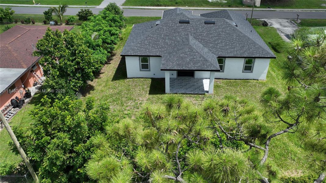 Front exterior of a new home in , Lehigh Acres, FL, highlighting curb appeal (Image 18). Front exterior of a new home in , Lehigh Acres, FL, highlighting curb appeal (Image 18).