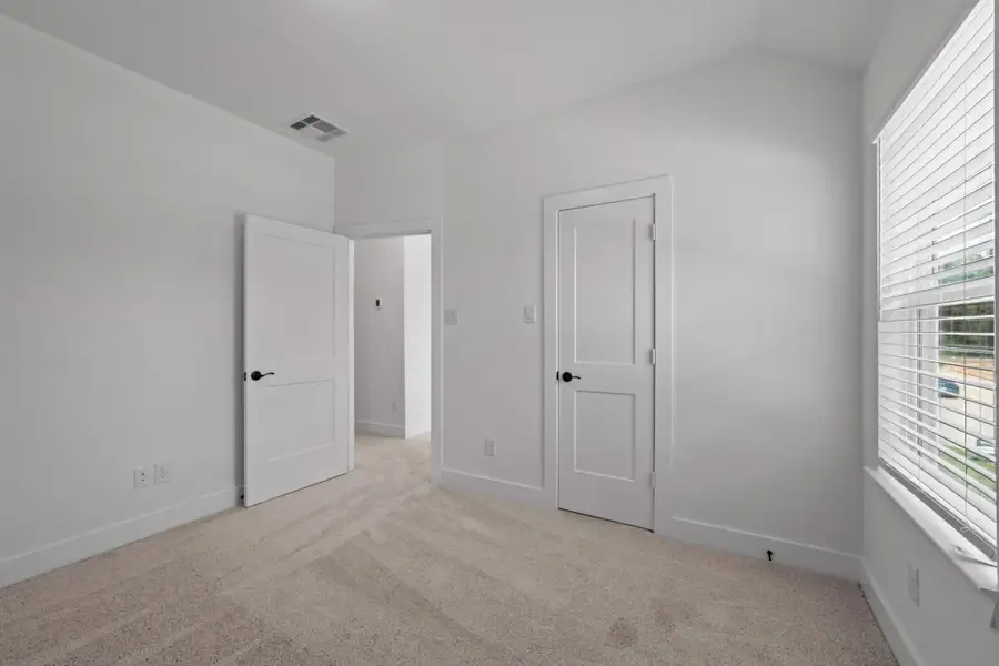 Spacious, unfurnished interior of a new home in The Woodlands Hills, Willis (Image 5).