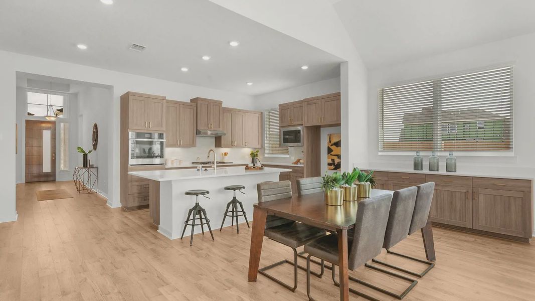 Representative furnished interior of a home built from the Lauren by Chesmar Homes in University Heights, Round Rock (Image 10).