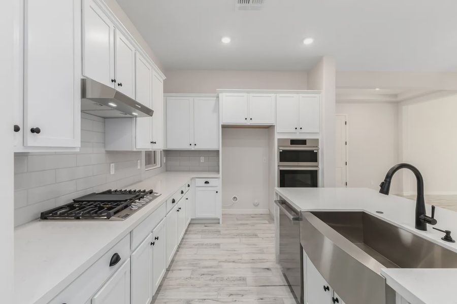 Furnished interior view inside a new home in Valencia at Granite Vista, Waddell (Image 7).