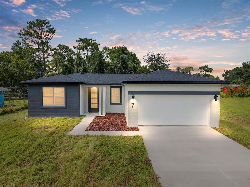 Front exterior of a new home in , Ocala, FL, highlighting curb appeal (Image 34).