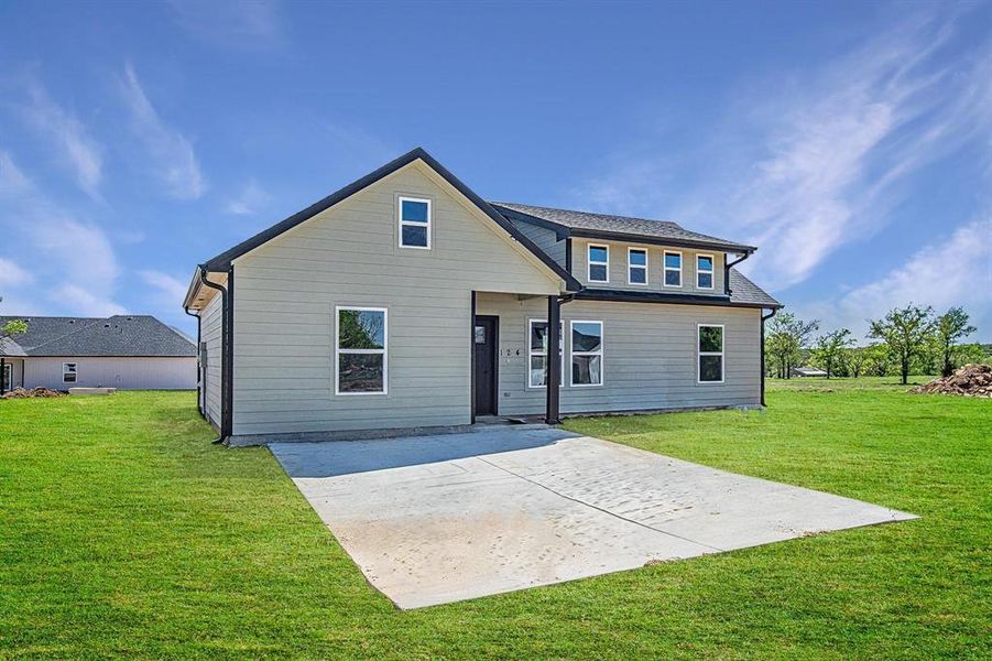 Front exterior of a new home in , Bridgeport, TX, highlighting curb appeal (Image 2). Front exterior of a new home in , Bridgeport, TX, highlighting curb appeal (Image 2).