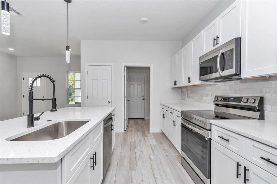 Furnished interior view inside a new home in , Poinciana (Image 8). Furnished interior view inside a new home in , Poinciana (Image 8).