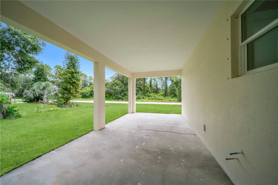 Exterior details and patio area of a home in , Lehigh Acres (Image 4).