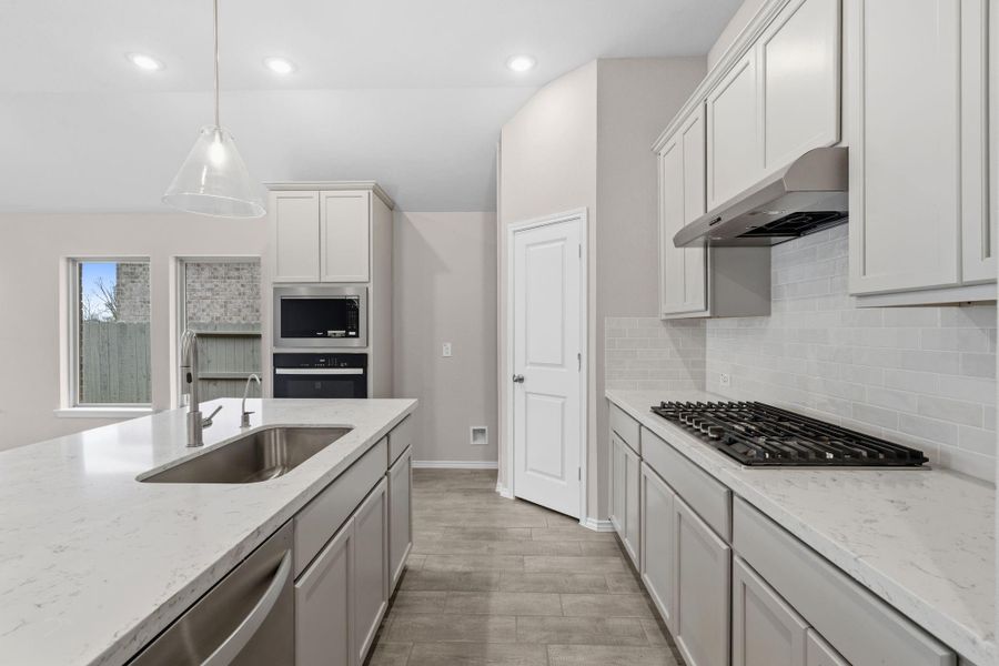 Furnished interior view inside a new home in Pomona, Manvel (Image 11).