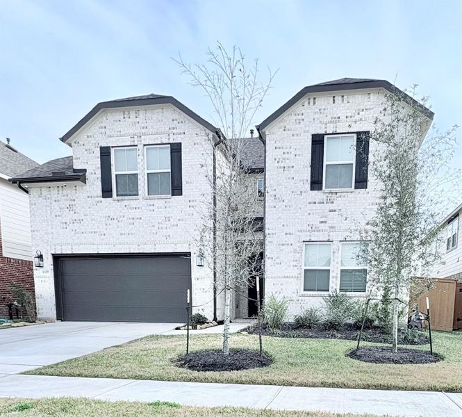 Front exterior of a new home in , Cypress, TX, highlighting curb appeal (Image 17).