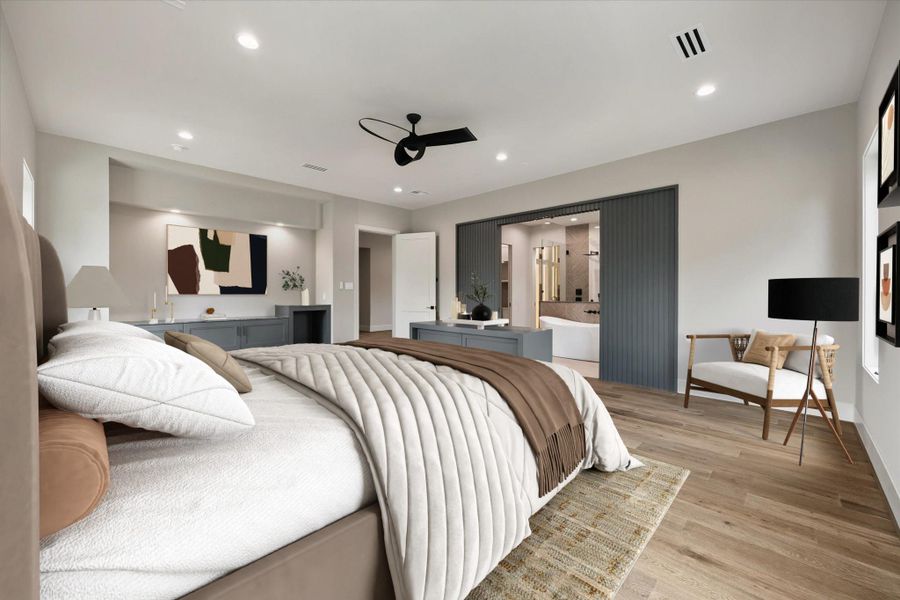 The primary bedroom includes a sleek floating cabinet with quartz countertops, adding both style and functionality to the space. Designed with room for a beverage cooler, it creates a convenient refreshment area that enhances the comfort and luxury of the suite.