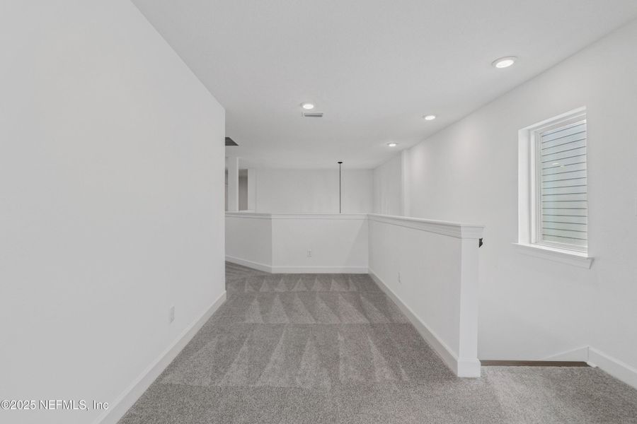 Spacious, unfurnished interior of a new home in Evergreen Island at Silverleaf - Classic, St. Augustine (Image 21).