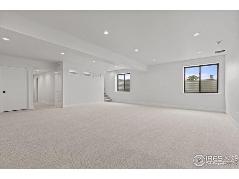 9' basement ceilings make this large great room feel even bigger