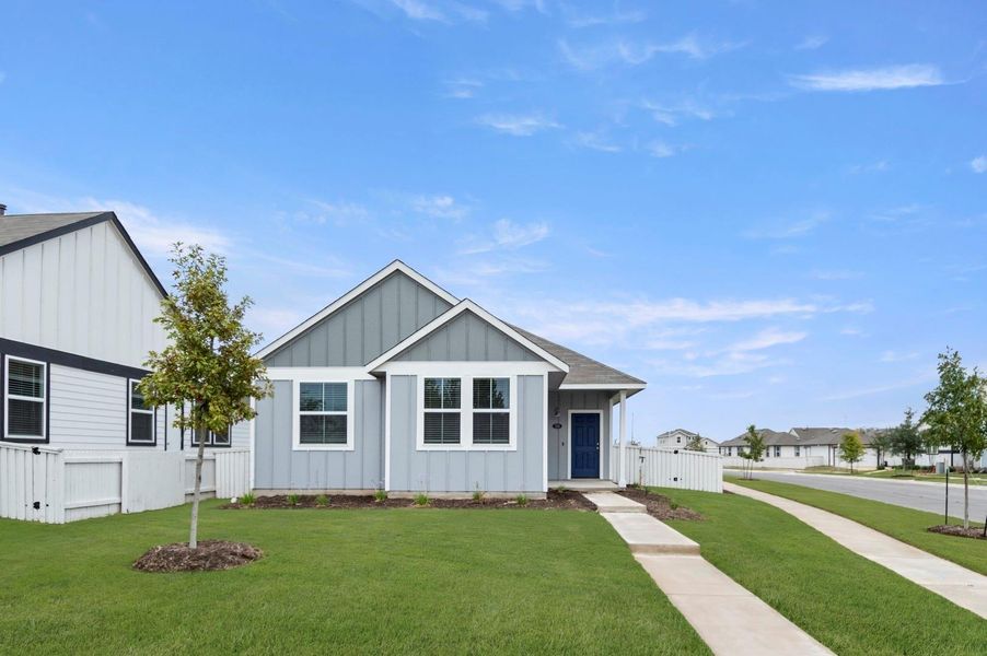 Front exterior of a new home in Casetta Ranch, Kyle, TX, highlighting curb appeal (Image 18).