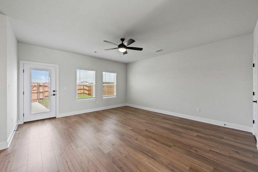 Spacious, unfurnished interior of a new home in Whisper Valley, Manor (Image 13).