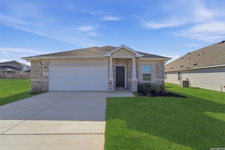 Front exterior of a new home in Cloud Country, New Braunfels, TX, highlighting curb appeal (Image 2).