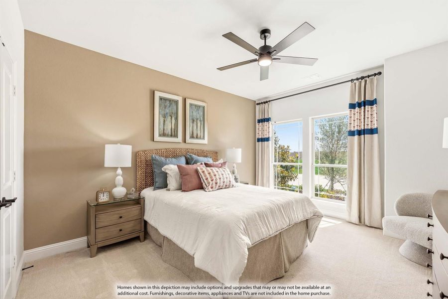 Bedroom with queen bed, ceiling fan, carpet flooring, and large window with curtains